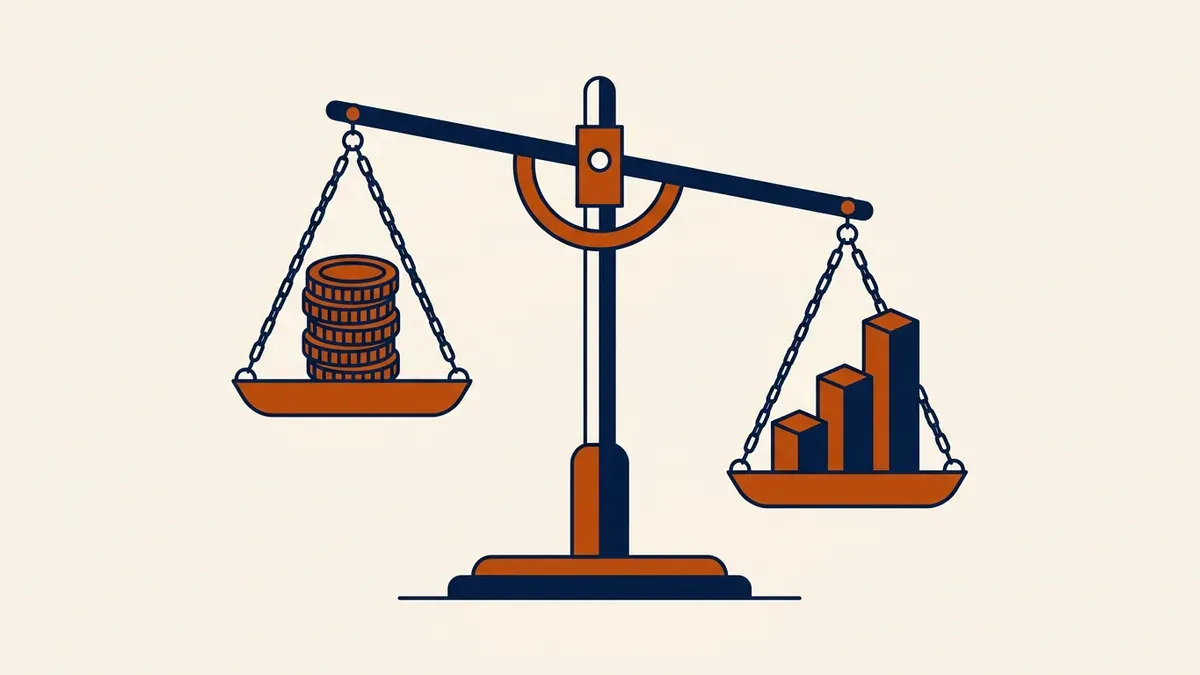 A scale weighing a stack of coins against a rising bar chart